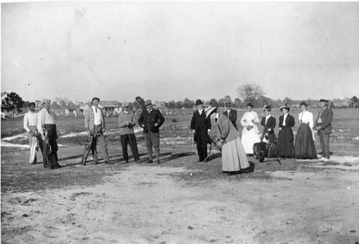 Center, in plus fours, on the teeing ground, Sarasota c. 1905.